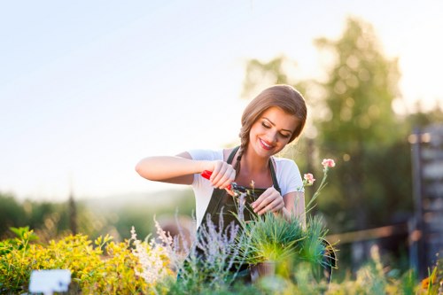 Client reviewing a landscaping complaint form in a garden setting